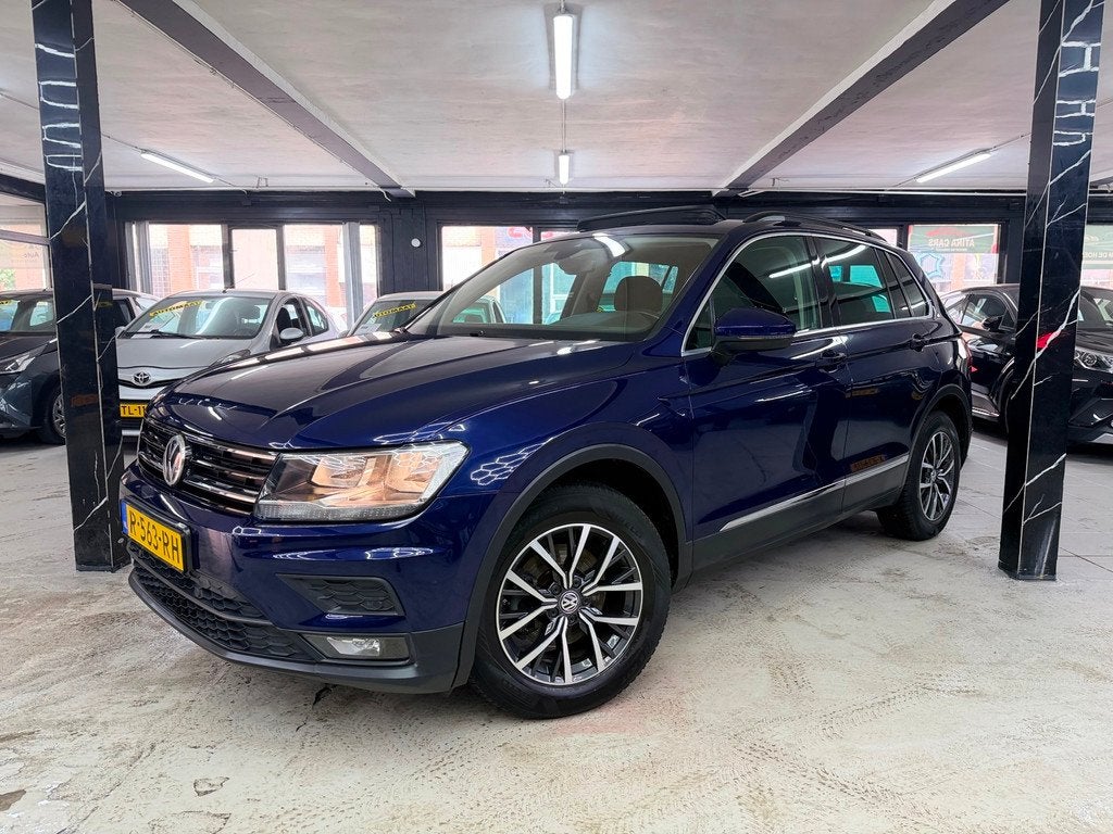 Volkswagen Tiguan 1.4 TSI ACT Highline Business R Pano, Auto's, Volkswagen, Euro 6, 4 cilinders, 150 pk, Blauw