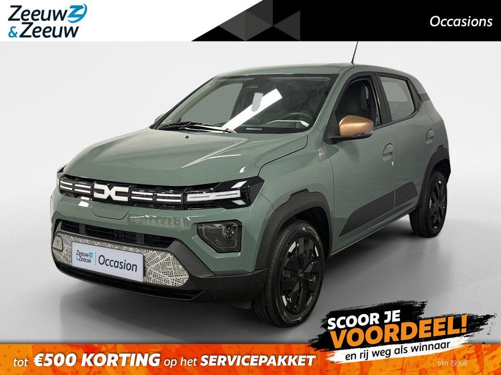 Dacia Spring Extreme 65 26.8 kWh AUTOMAAT CAMERA APPLE CARPL, Auto's, Dacia, 12 maanden, Gebruikt, 4 stoelen, Leder en Stof