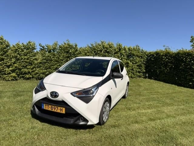 Toyota Aygo 1.0 Vvt-i 72pk 5D 2018 Wit, Auto's, Toyota, Voorwielaandrijving, Stof, 4 stoelen, Wit