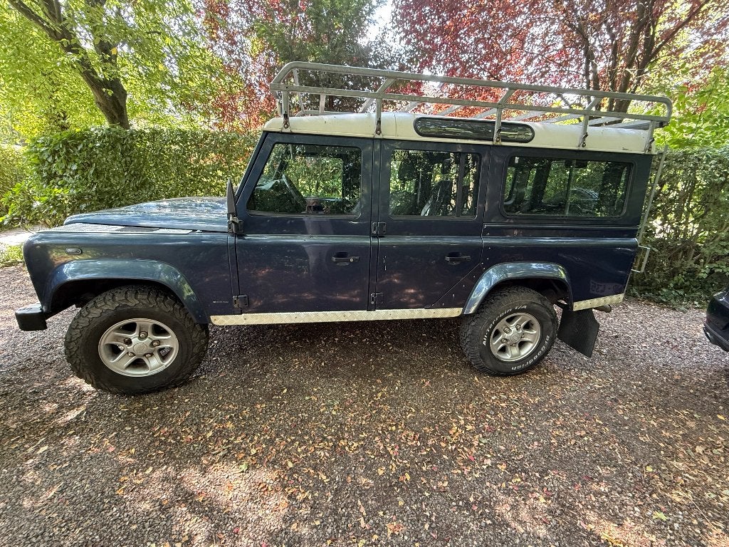 Te koop Land Rover Defender 110 Station Wagon, 2,4 TD, Voorwielaandrijving, 4 cilinders, Blauw, Leder en Stof