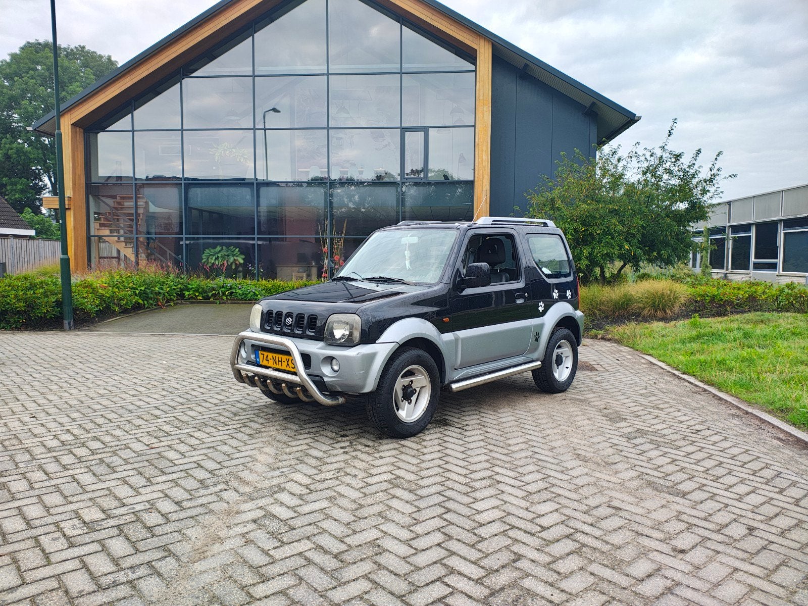 Suzuki Jimny 1.3 JX 4WD 2003 Zwart, Auto's, Zwart, 4 cilinders, Zwart, Handgeschakeld