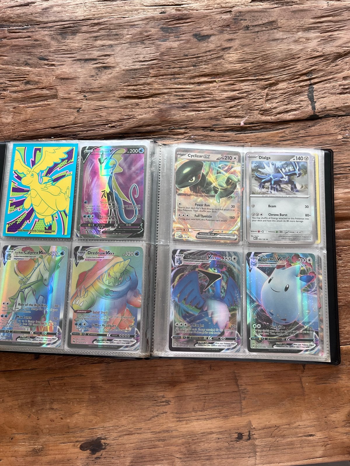 Grote collectie Pokémon kaarten in map, Ophalen of Verzenden, Gebruikt, Meerdere kaarten, Foil