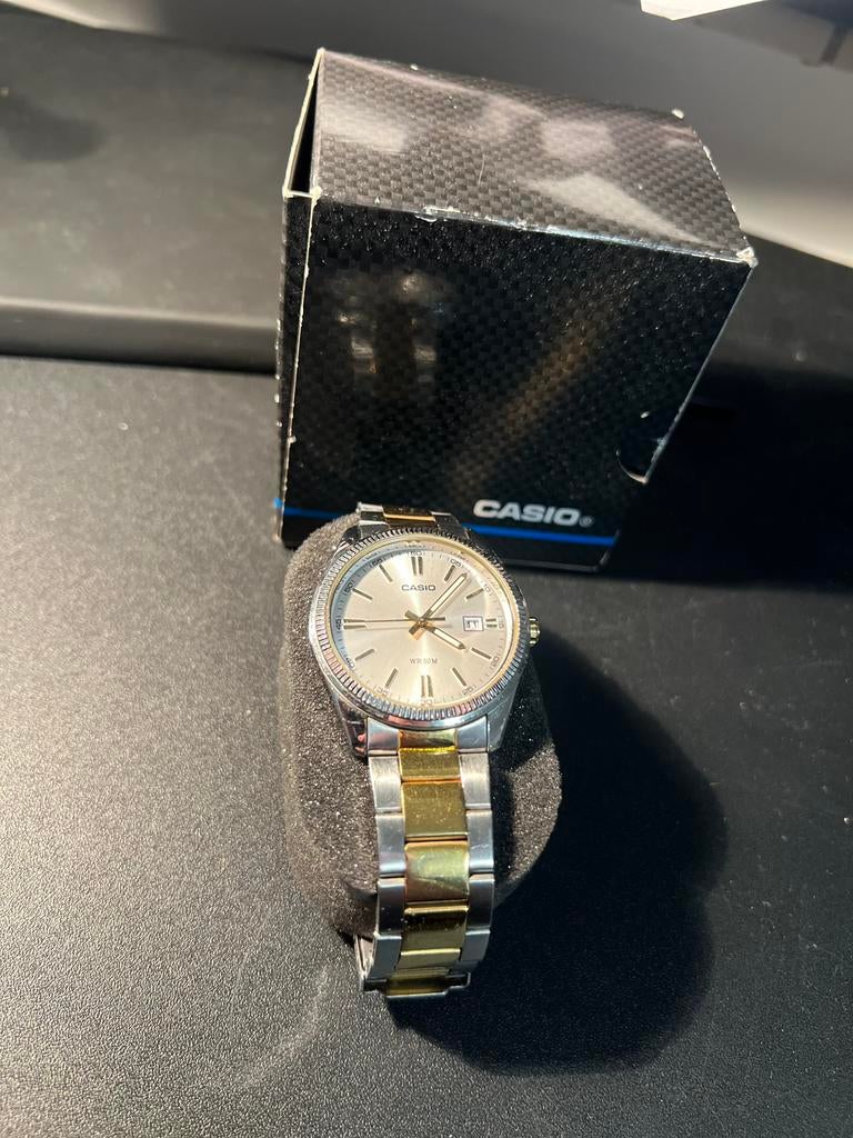Casio horloge dames - zilver en goud kleurig, Ophalen of Verzenden, Zo goed als nieuw, Zwart, Jongen of Meisje
