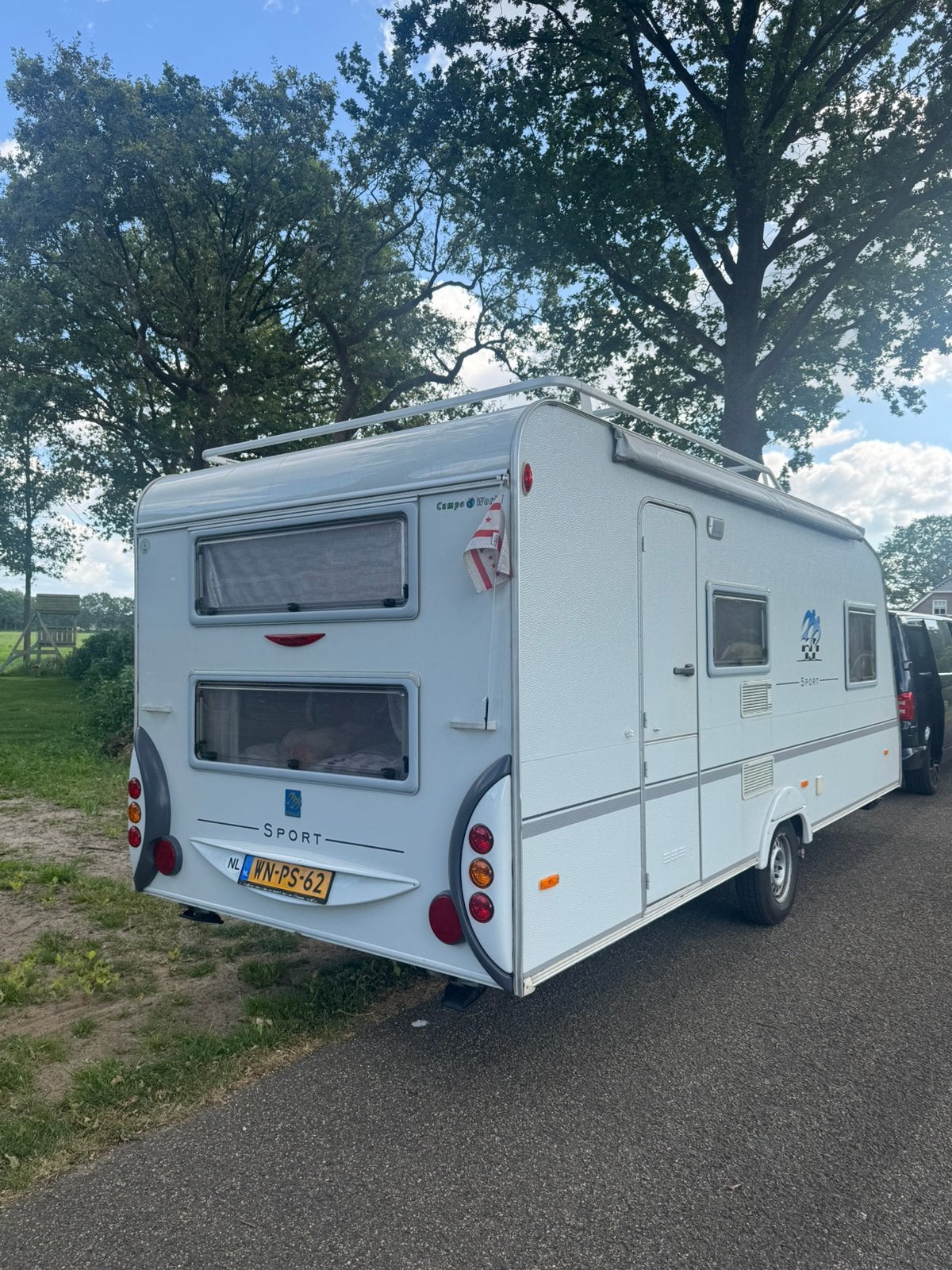 Knaus sport 550QDK 2004 mover,airco,luifel,stapelbed, Caravans en Kamperen, Rondzit, Particulier, Dwars-stapelbed, 5 tot 6 meter