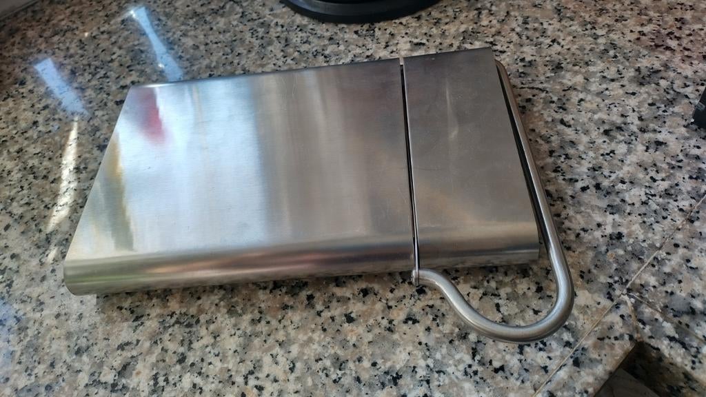 Kaassnijder voor zachte kazen, Ophalen