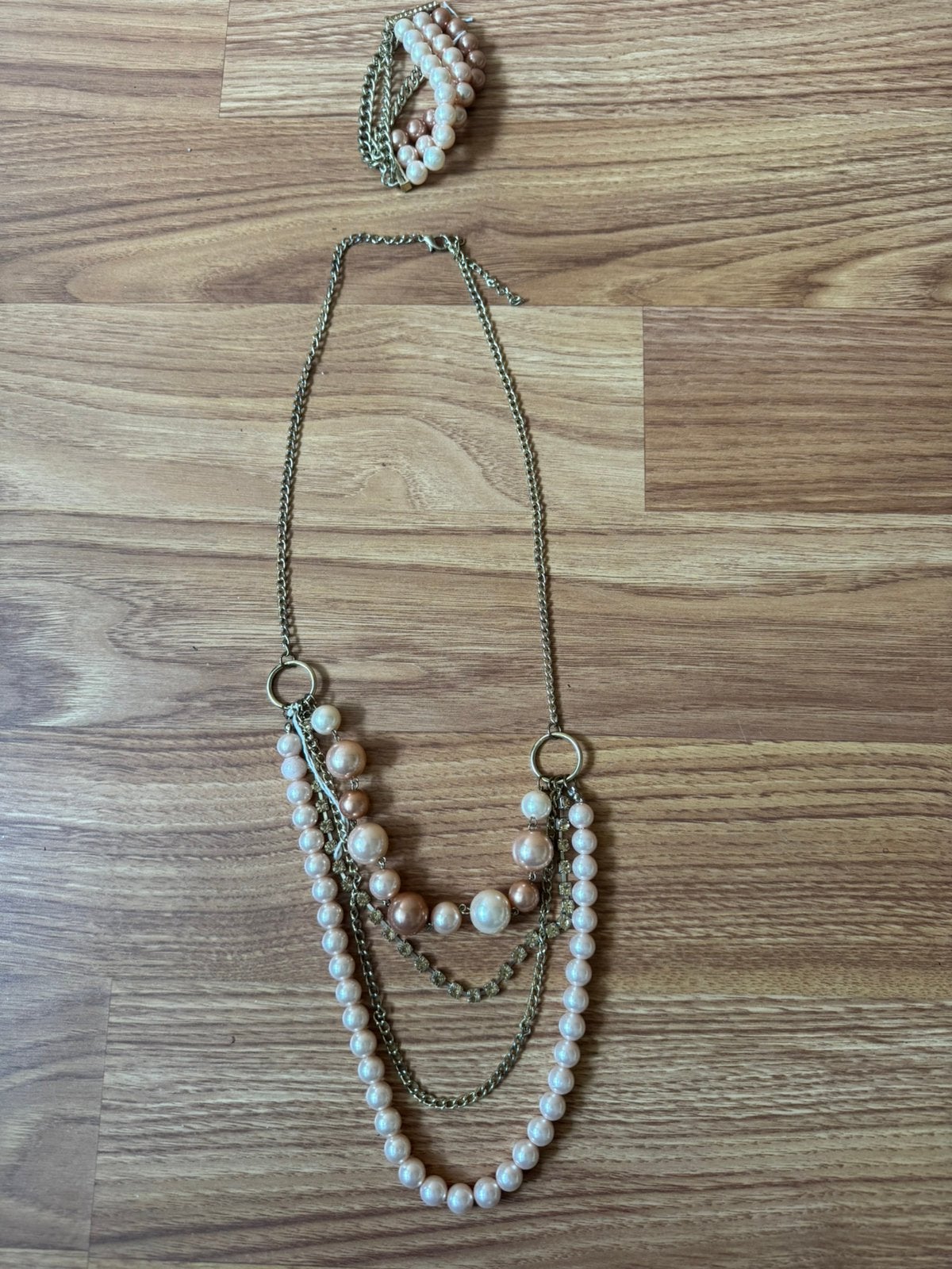 Nieuwe roze / zalmkleur ketting met armband, Sieraden, Tassen en Uiterlijk, Kettingen, Ophalen, Nieuw, Roze, Overige materialen