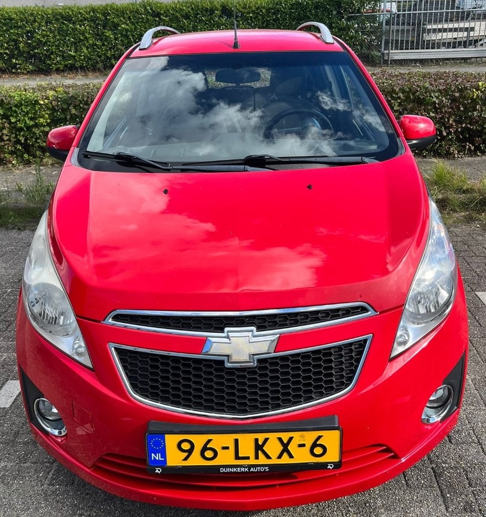 Chevrolet Spark 1.0 LT Rood 2010, Auto's, Chevrolet, Voorwielaandrijving, Stof, 4 cilinders, 68 pk