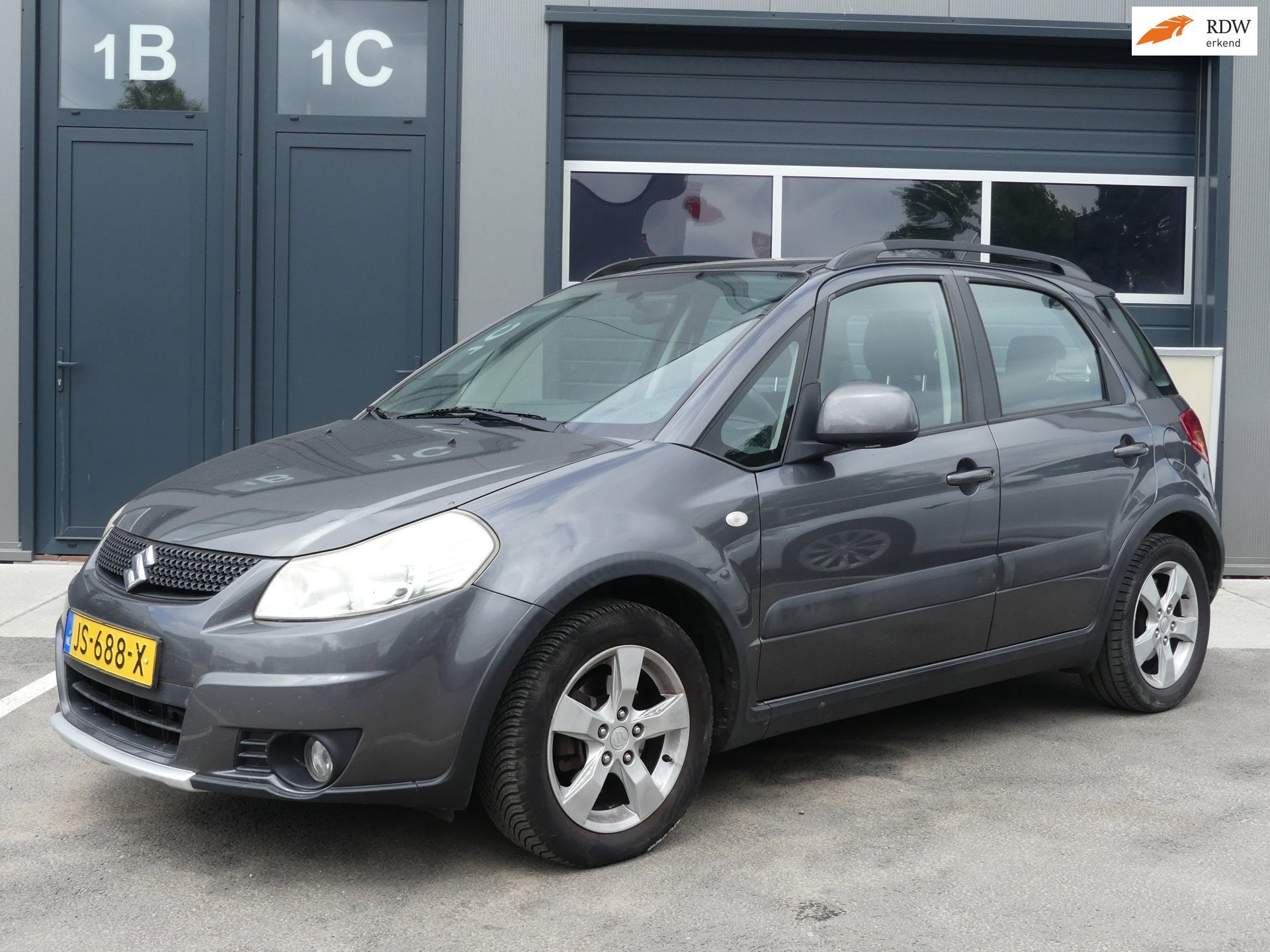 Suzuki SX4 1.6 Comfort Airco 5-Drs Navigatie Lmv APK t/m 11-, Auto's, Suzuki, Voorwielaandrijving, Euro 5, Stof, Gebruikt