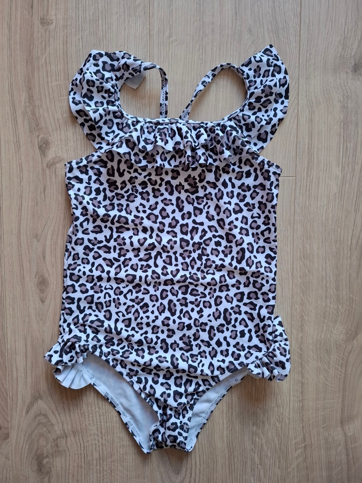 Mooi cheetah badpak. Maat 122 (7Y), Ophalen of Verzenden, Zo goed als nieuw, Meisje, Broek