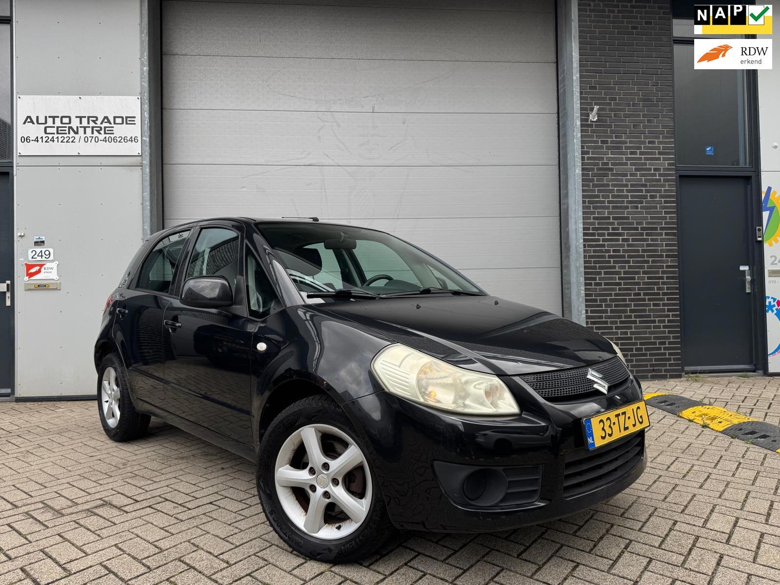 Suzuki SX4 1.6 Comfort [ 1e eig | Airco | Trekhaak | Elek pa, Auto's, Stof, Gebruikt, Zwart, 4 cilinders