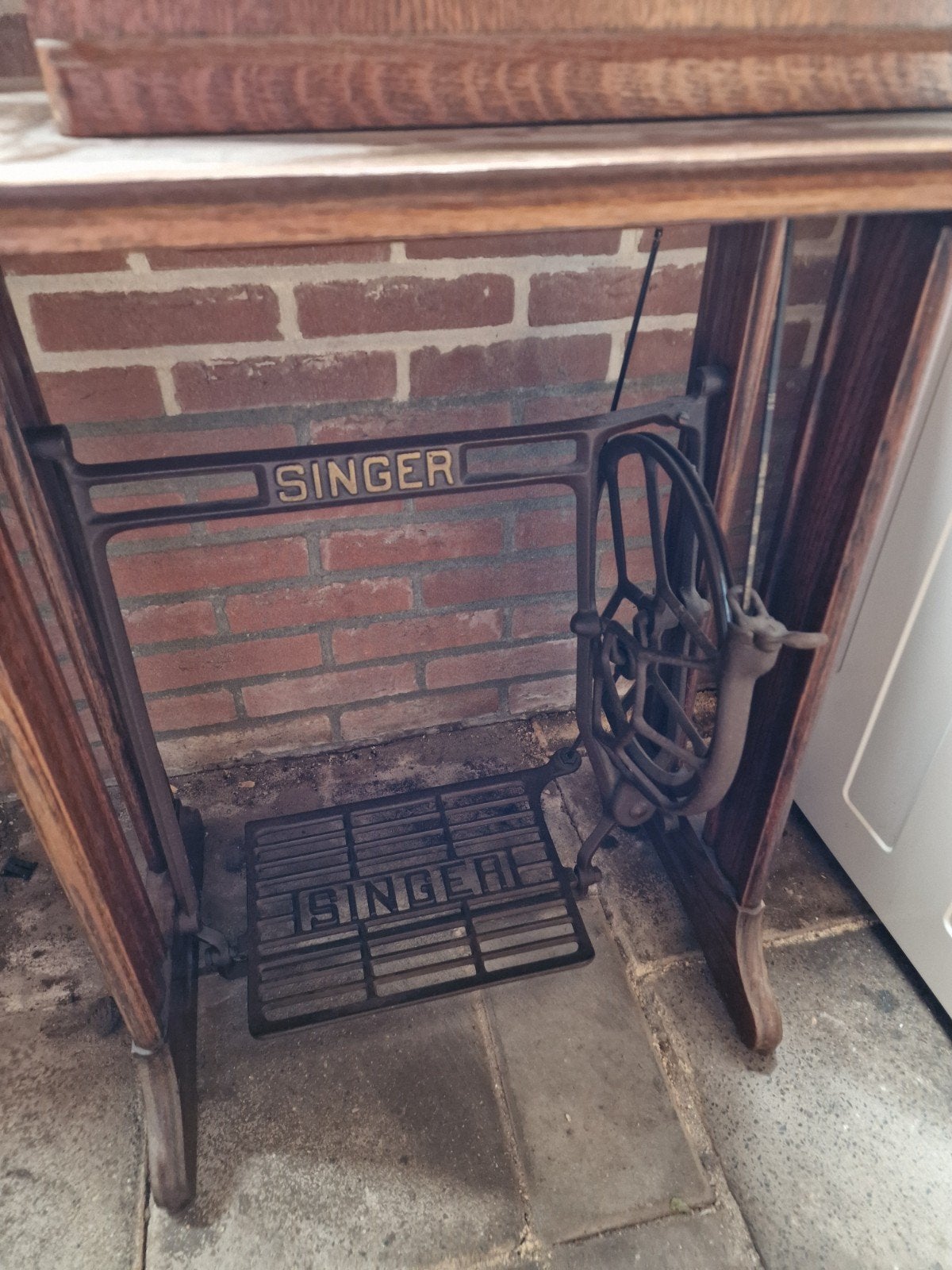 singer naaimachine, Ophalen