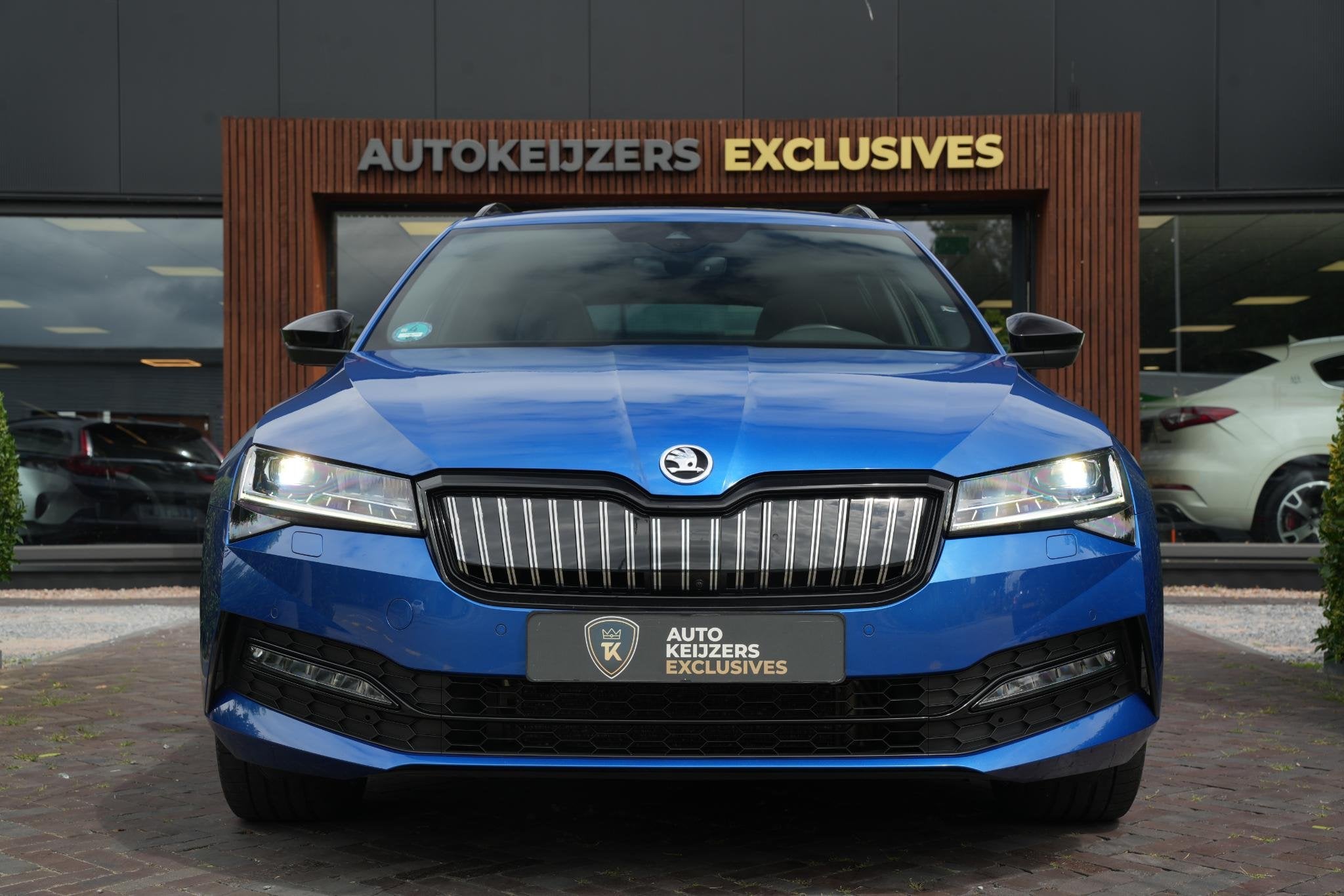 Skoda Superb Combi 1.4 iV Sportline Panoramadak Canton 360 C, Auto's, Gebruikt, Automatische klimaatregeling, Blauw, Alcantara
