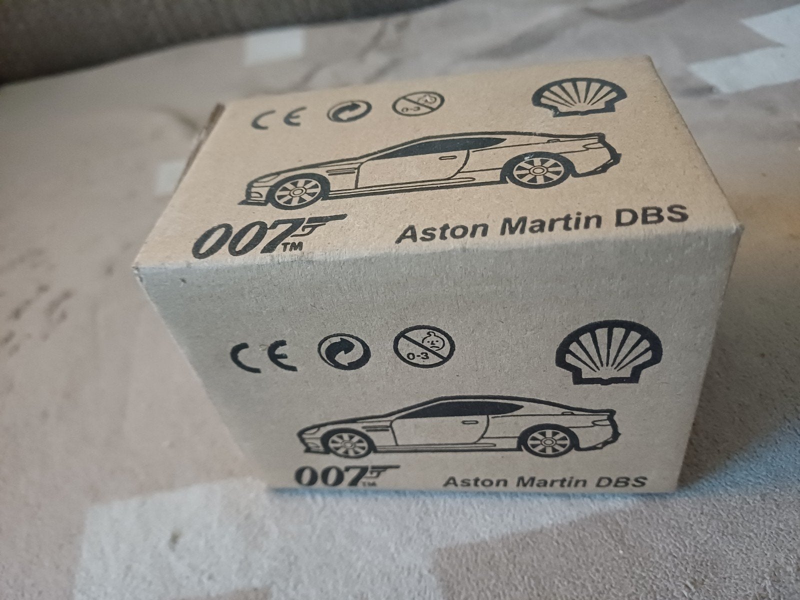 James Bond 007 Aston Martin DBS modelauto Shell, Ophalen of Verzenden, Zo goed als nieuw, Auto, Overige merken