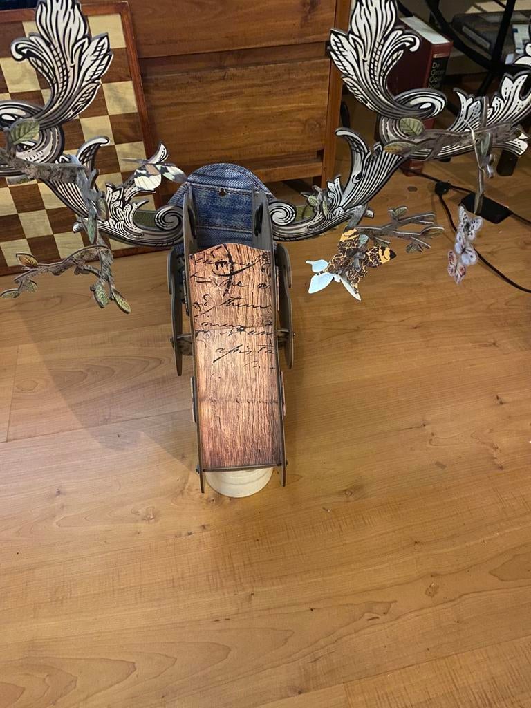 Kunst  karton hoofd koe, Ophalen