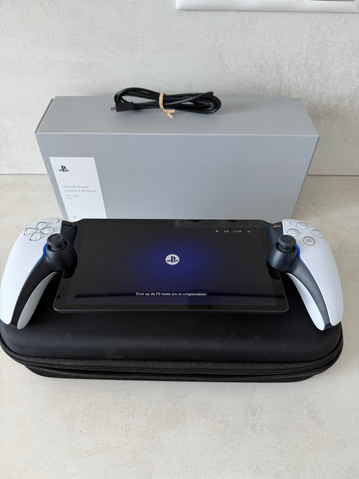 Sony PlayStation Portal Remote Player met hoes, Ophalen of Verzenden, Zo goed als nieuw
