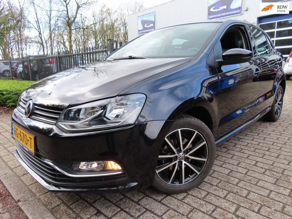 Volkswagen Polo 1.2 TSI Comfortline, Auto's, Volkswagen, Stof, Euro 6, 4 cilinders, Zwart