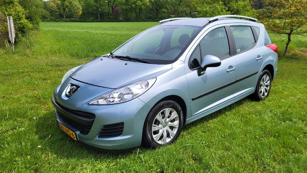 Peugeot 207 SW 1.4 95pk Lage KM stand Rijklaar NAP, Voorwielaandrijving, Euro 5, Stof, Zwart