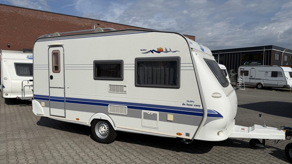 Hobby De luxe Easy 440 SF bj 2005 met voortent en luifel, Caravans en Kamperen, Caravans, Hobby, Bedrijf, Treinzit, 4 tot 5 meter