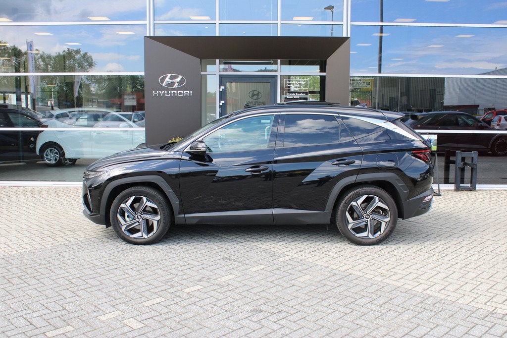 Hyundai Tucson 1.6 T-GDI 265pk PHEV Premium Sky 4WD | Schuif, Auto's, Hyundai, 12 maanden, Gebruikt, Overige carrosserieën, Overige brandstoffen