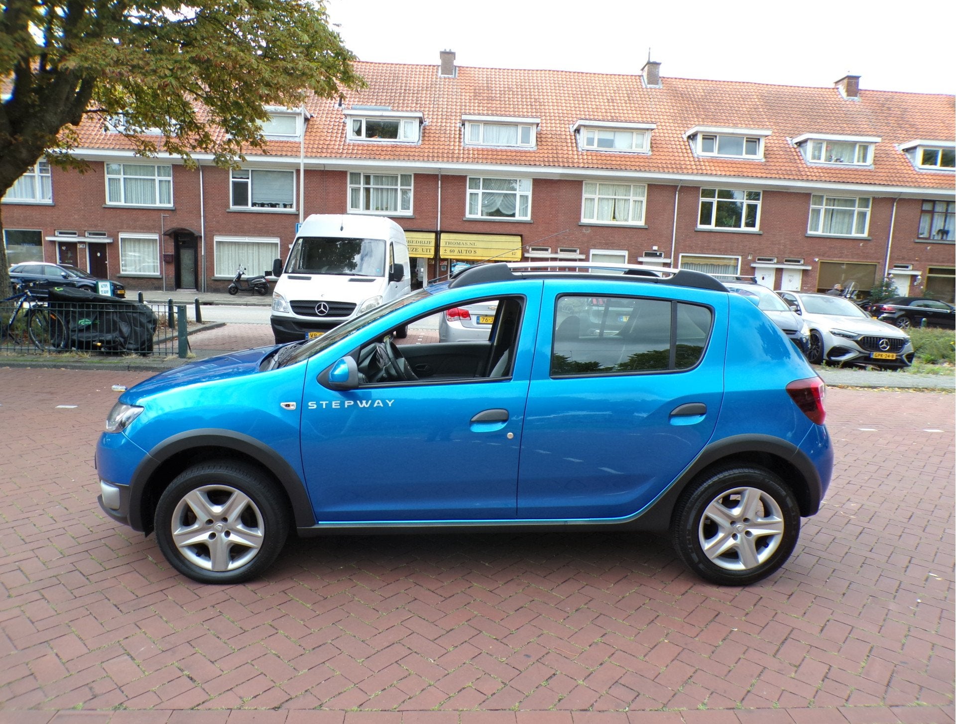Dacia Sandero 0.9 TCe Stepway Lauréate ORG KM STAND NAP AAN, Auto's, Voorwielaandrijving, Gebruikt, 31 €/maand, Blauw