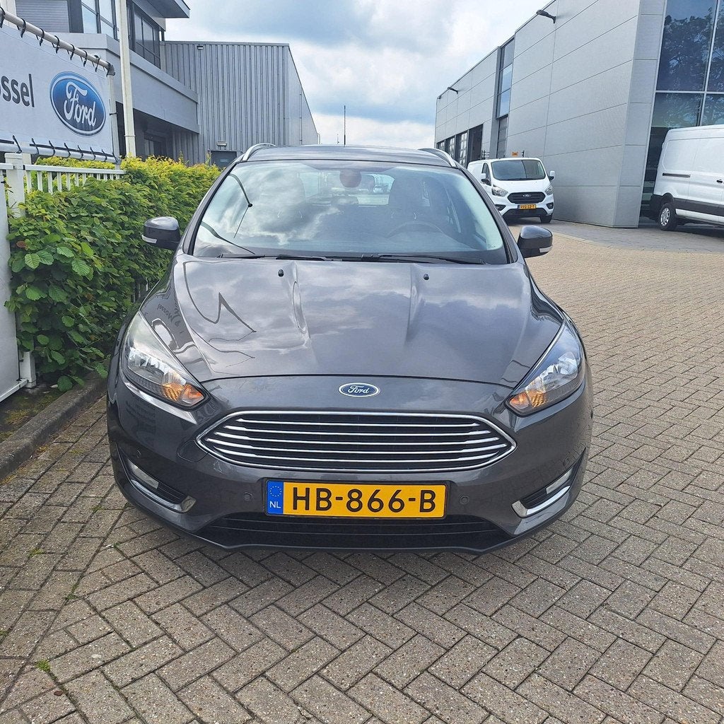 Ford Focus Wagon 1.0 Titanium Edition 125pk | Cruise Control, Auto's, 12 maanden, Gebruikt, Euro 6, Handgeschakeld