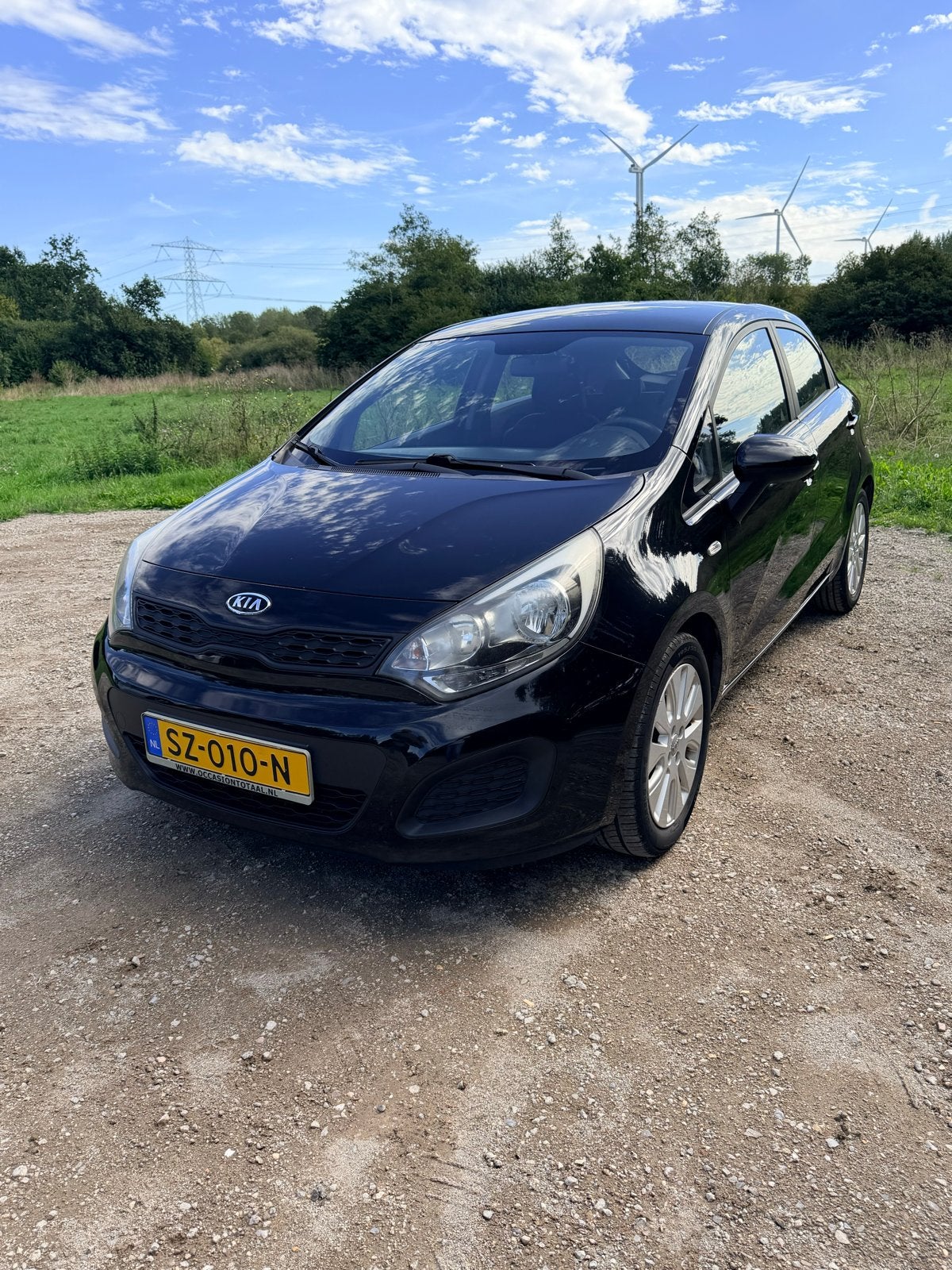 Kia Rio 1.2 I 5DRS 2012 Zwart, Auto's, Kia, Voorwielaandrijving, 40 €/maand, 4 cilinders, 1104 kg
