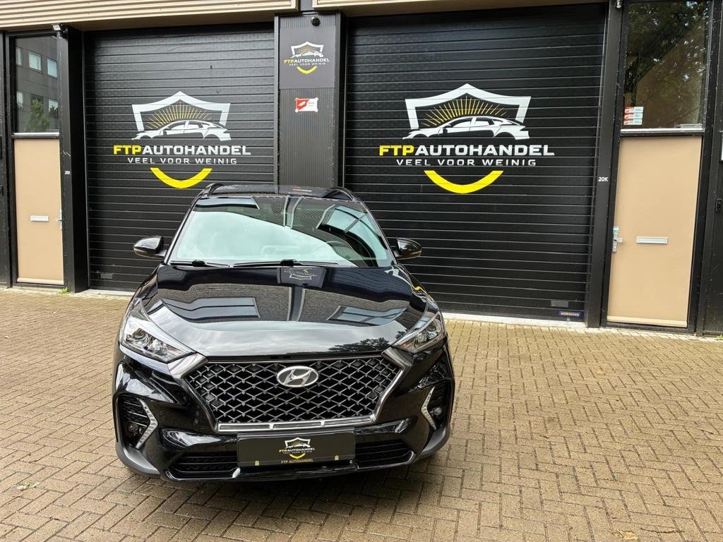 Hyundai Tucson 1.6 T-GDI N-Line Carplay Dealer onderhouden, Auto's, Hyundai, Zwart, Leder en Stof, Zwart, Bedrijf