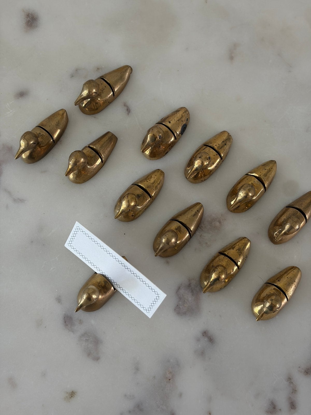 12 vintage messing eendjes naamkaarthouders, Ophalen of Verzenden