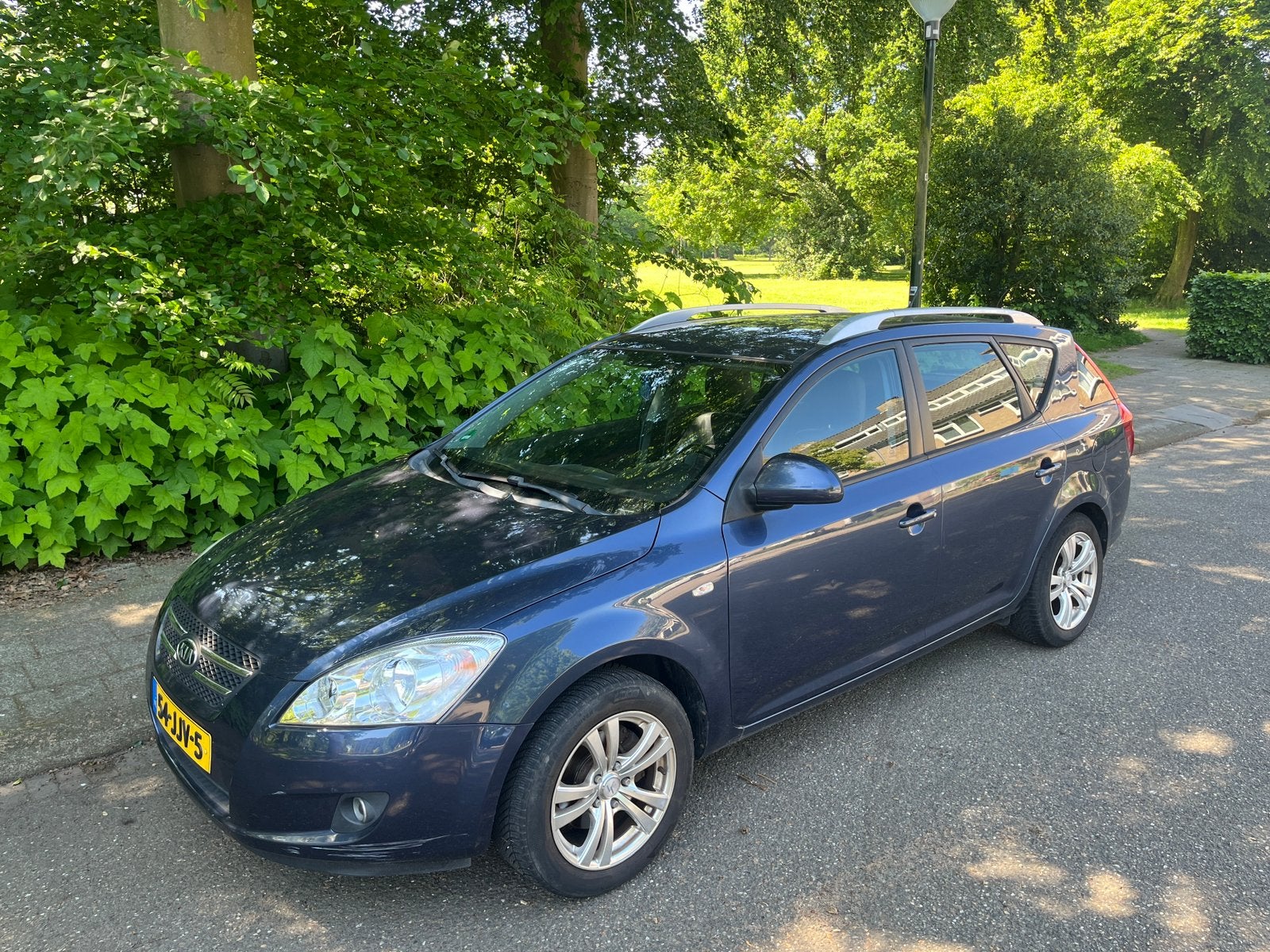 Kia Ceed 1.4 Sporty Wagon (2009) Trekhaak, Climate Control, Auto's, Kia, Voorwielaandrijving, Zwart, 4 cilinders, 1396 cc