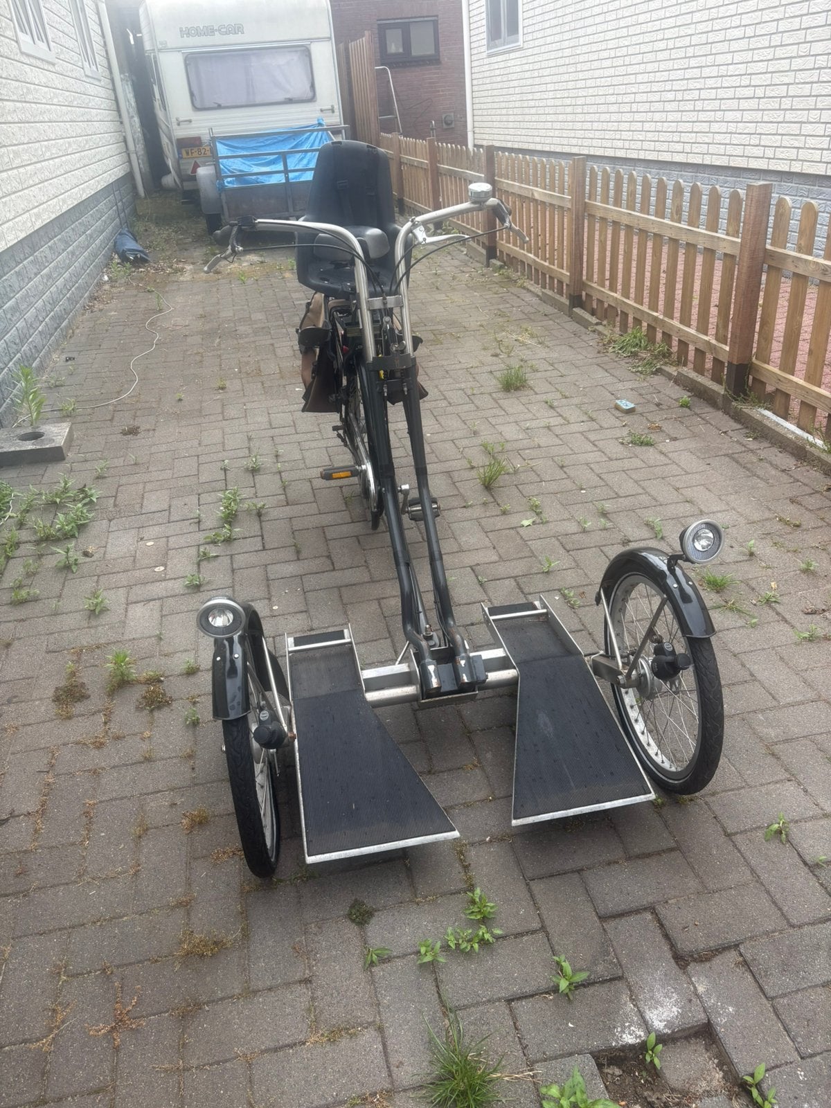 Driewielfiets rolstoel, Ophalen