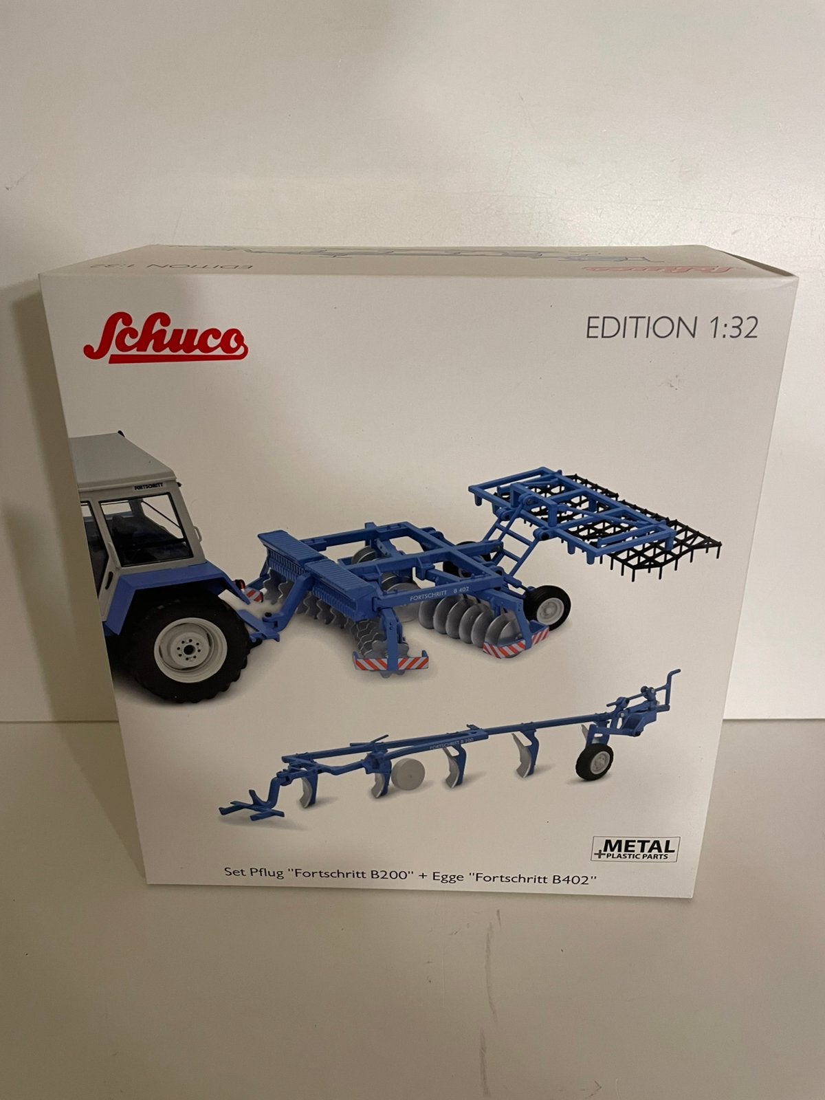 Schuco 1:32 set fortschritt ploeg en eg nieuw in doos, Ophalen of Verzenden, Nieuw, Tractor of Landbouw, Schuco