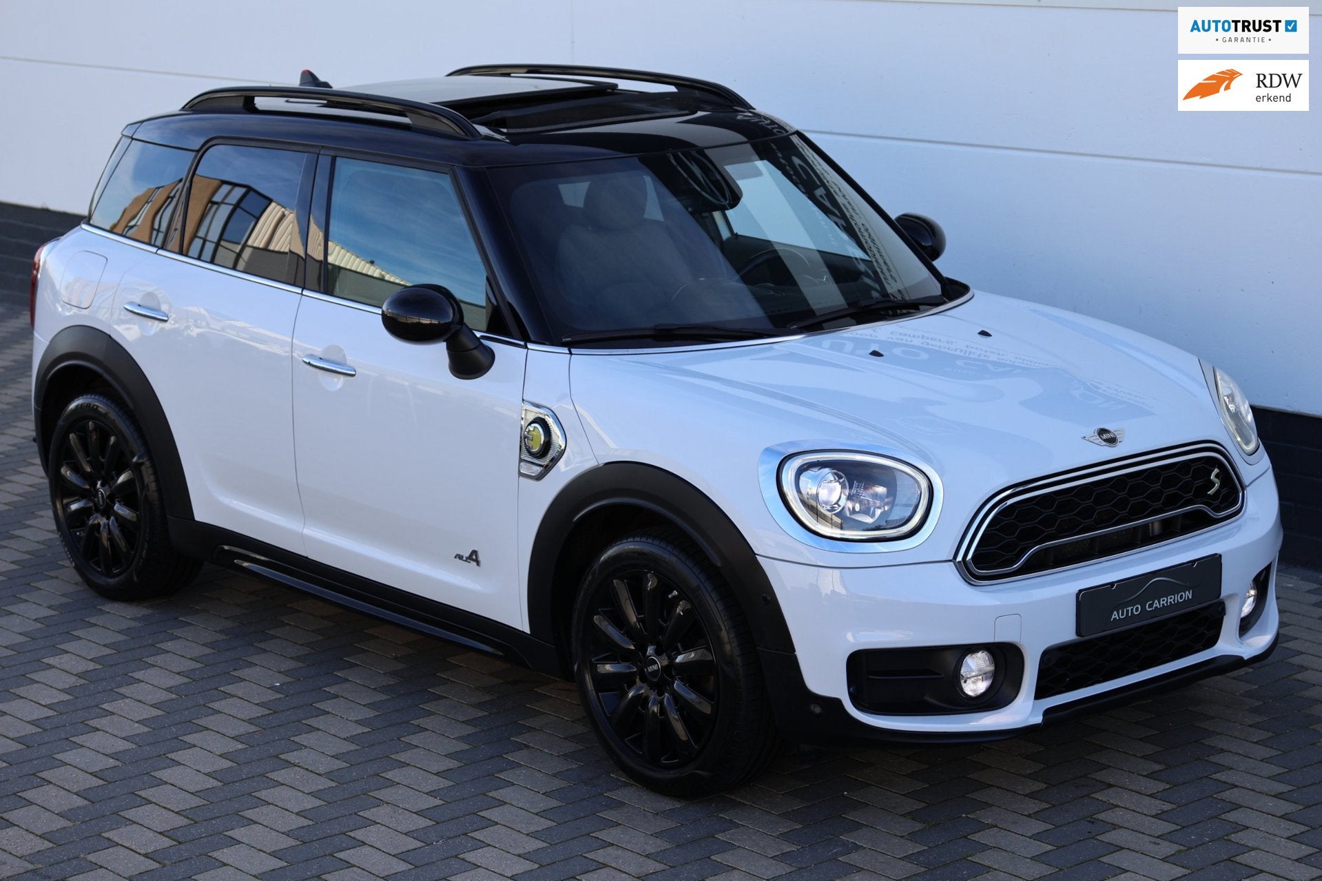 Mini Countryman 1.5 Cooper S E ALL4 Pano Navi Camera LED !, Auto's, Automaat, Gebruikt, Zwart, Leder en Stof