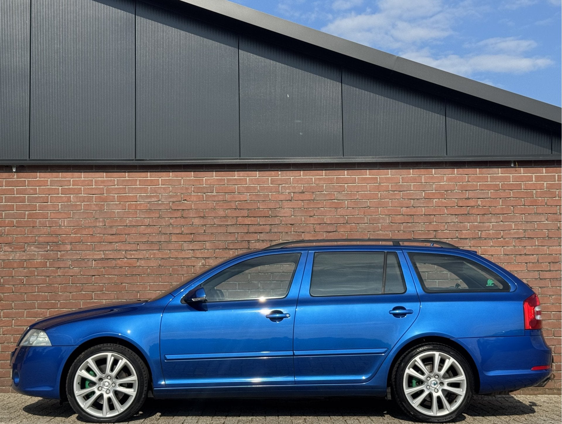 Skoda Octavia Combi 2.0 TFSI RS | NL-AUTO! | TREKHAAK!, Auto's, Automatische klimaatregeling, Gebruikt, Zwart, 4 cilinders
