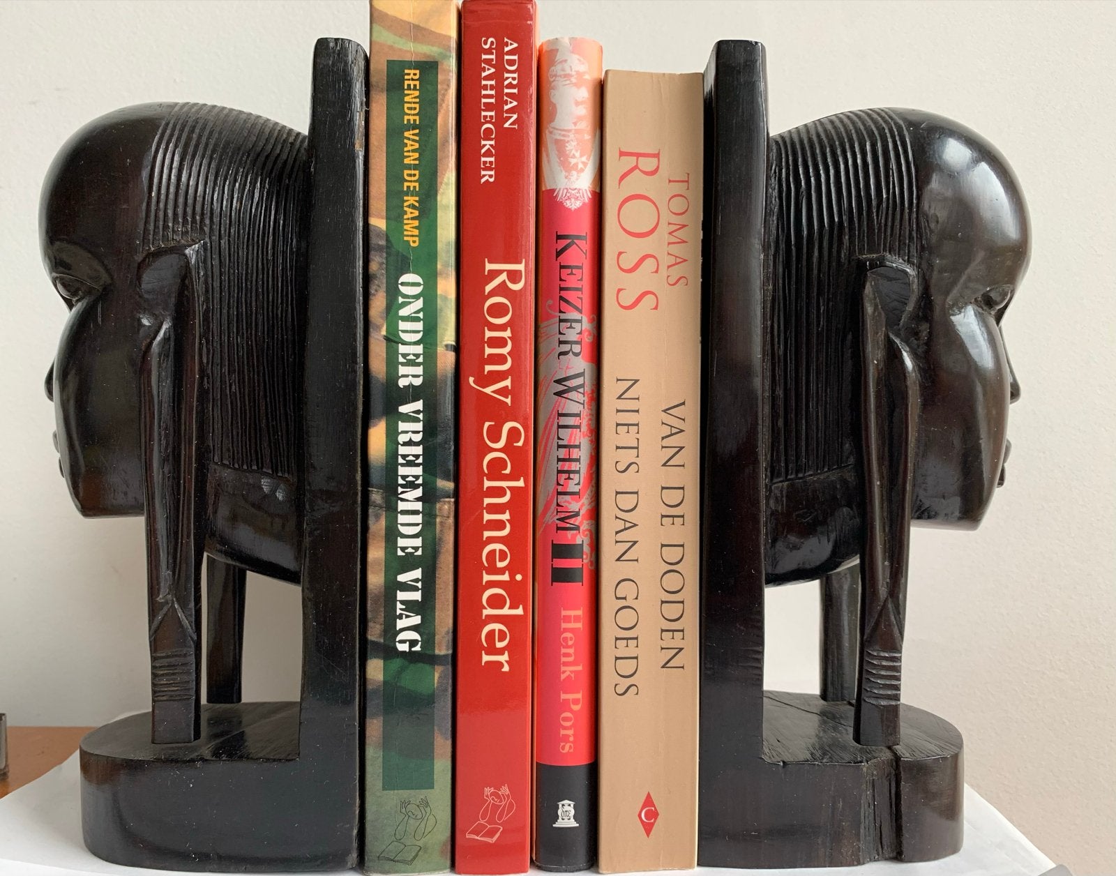 Zware ebbenhouten boekensteunen uit Afrika, 22 cm hoog, Ophalen of Verzenden