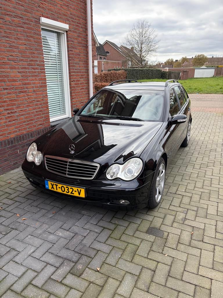 Mercedes-Benz C180 Kompressor Combi AUT Zwart, Auto's, Mercedes-Benz, Automaat, Zwart, 1796 cc, 11 km/l