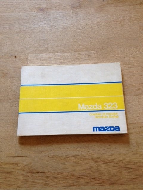 Mazda 323    Handleiding    1977      NL/Frans, Ophalen of Verzenden