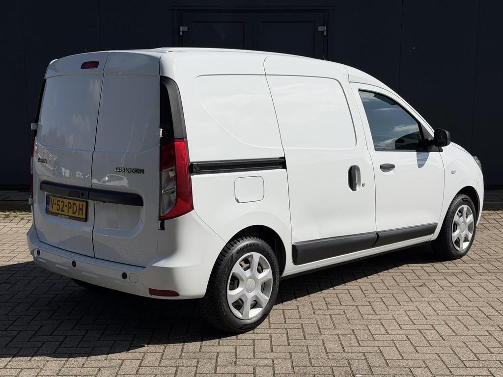 Dacia Dokker 1.5 Blue dCi 90 Essential / Trekgewicht 1200 Kg, Auto's, Stof, Gebruikt, Euro 6, Wit
