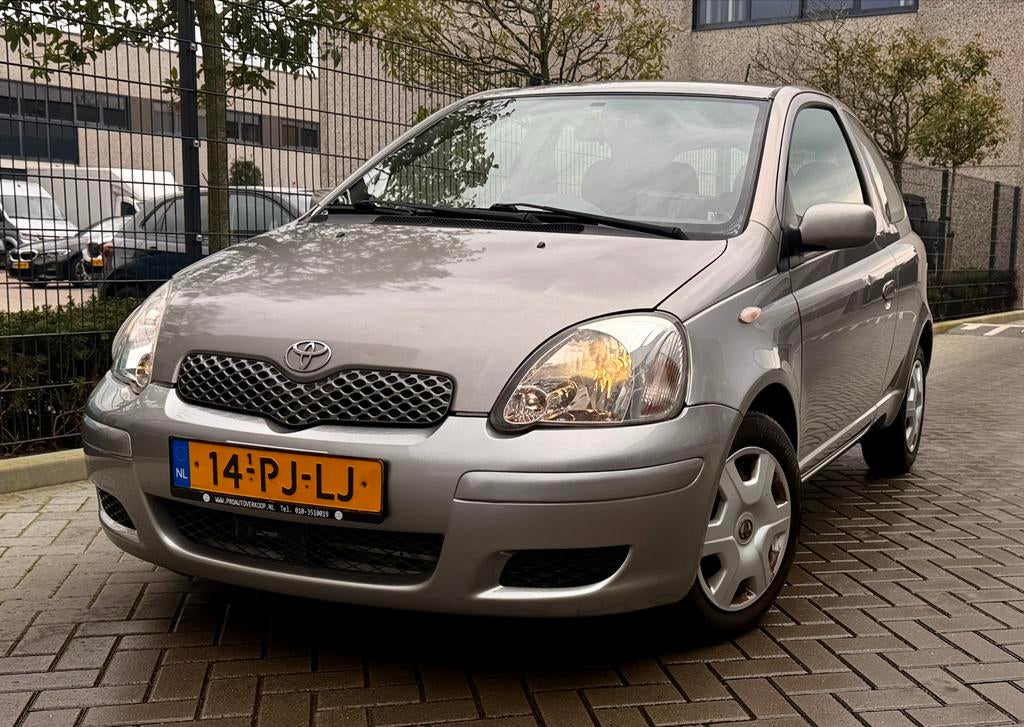 Toyota Yaris 1.3 16V Vvti 3DR Automaat 2004 Grijs Metalic, 4 cilinders, 400 kg, Leder en Stof, Origineel Nederlands
