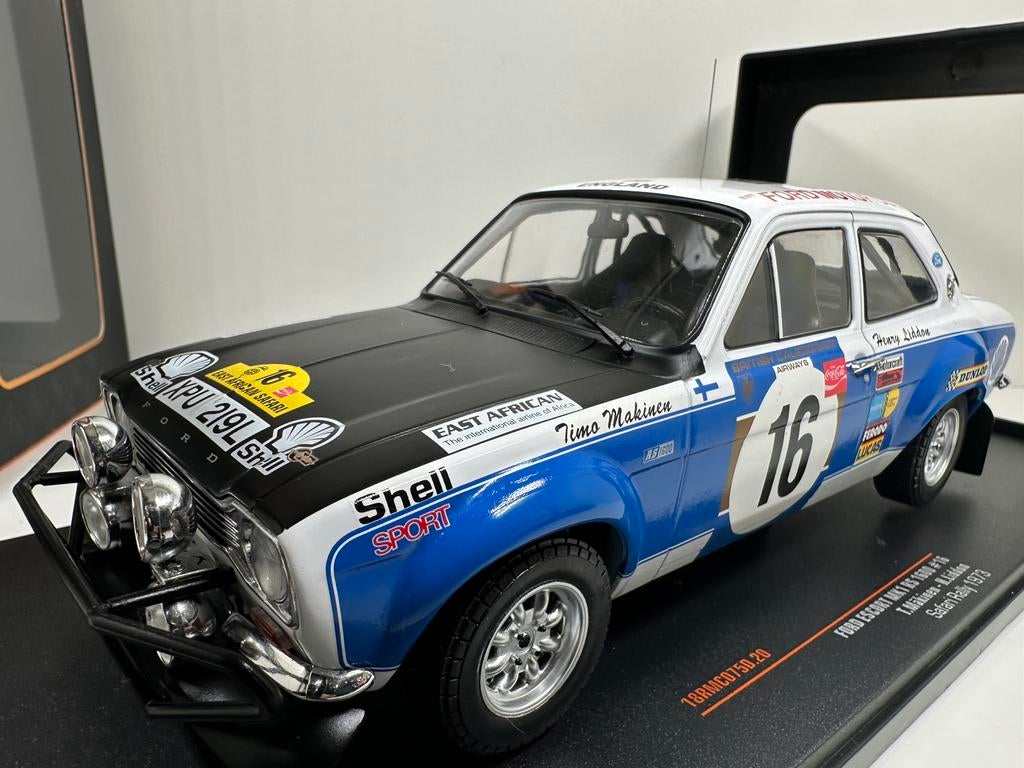 IXO FORD ESCORT MK1 RS1600 SAFARI RALLY'73 MÄKINEN1:18 NIEUW, Ophalen of Verzenden, Nieuw, Auto, Overige merken