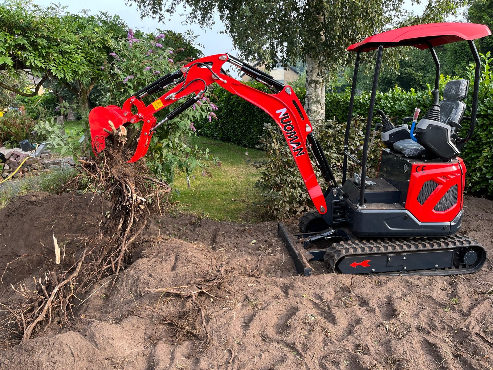 1800kg minigraver te huur
