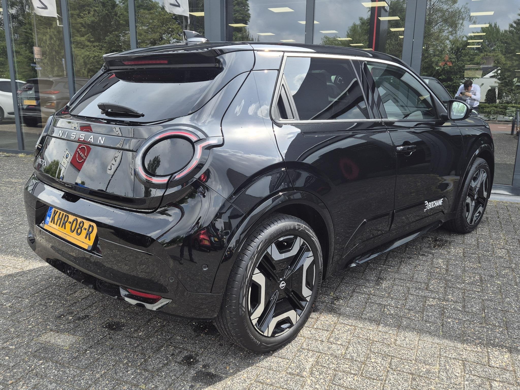 Nissan Micra Evolve 52 kWh | Demo | Navigatie | Harmon / Kar, Auto's, Stof, Huisgarantie, Zwart, Origineel Nederlands
