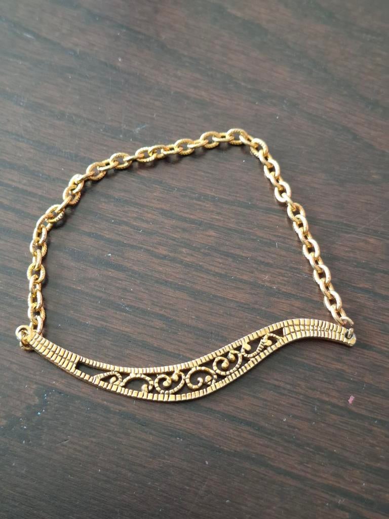 Goudkleurige armband met sierlijk patroon, Ophalen of Verzenden, Gebruikt, Goud, Overige materialen