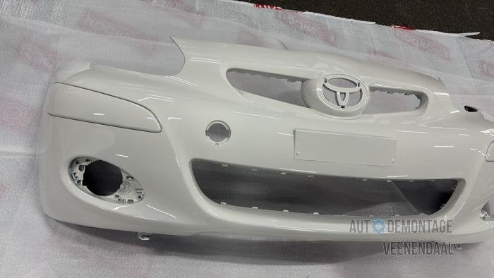 Voorbumper van een Toyota Aygo (068), Auto-onderdelen, Carrosserie en Plaatwerk, -, -, Nieuw, Ophalen of Verzenden