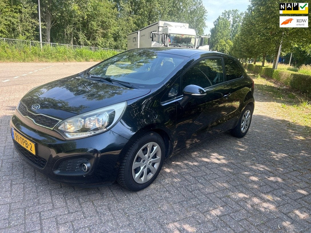 Kia Rio 1.2 CVVT Super Pack 2012! LED! CLIMATRONIC! KEYLESS!, Auto's, Euro 5, Zwart, 4 cilinders, Zwart