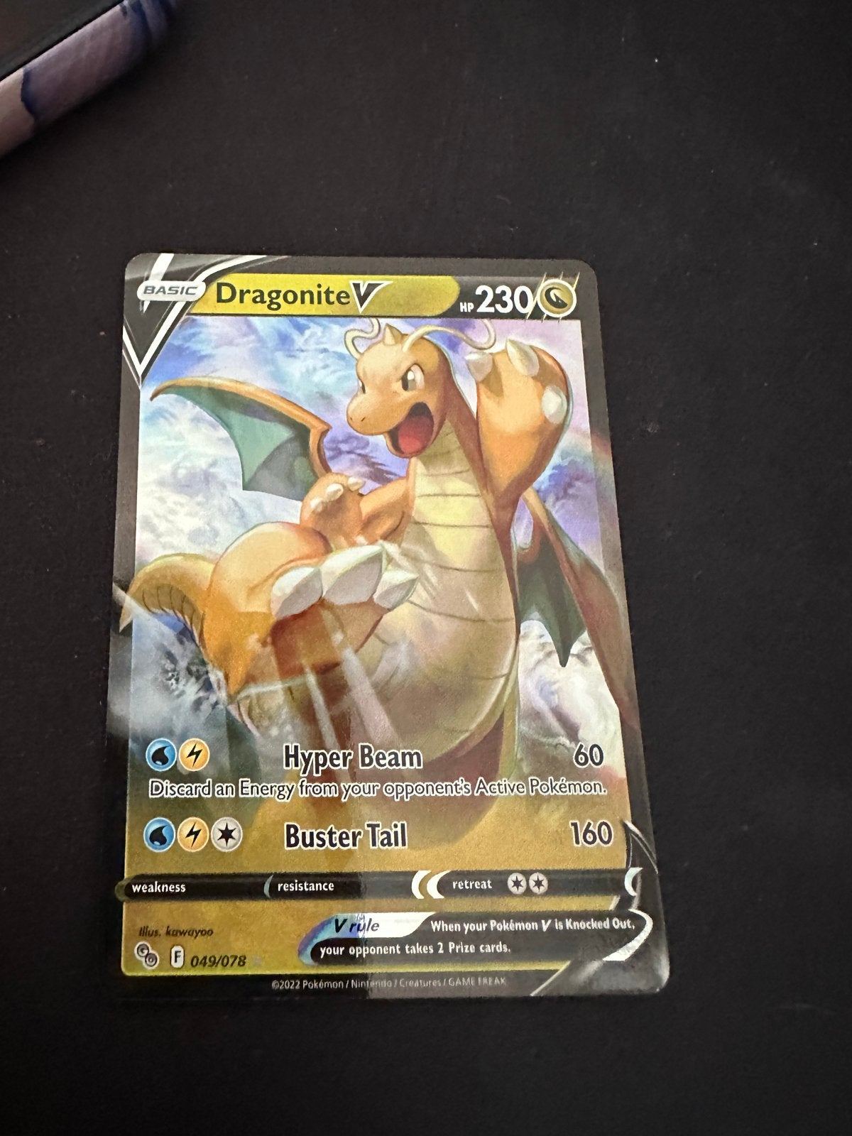 Dragonite V 049/078 - Bijna Mint Conditie, Hobby en Vrije tijd, Verzamelkaartspellen | Pokémon, Ophalen of Verzenden, Zo goed als nieuw