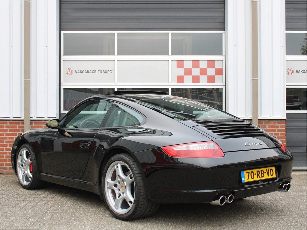 Porsche 911 3.6 Carrera 325PK NL AUTO/Climate/Cruise control, Auto's, Automaat, Achterwielaandrijving, Zwart, 4 stoelen