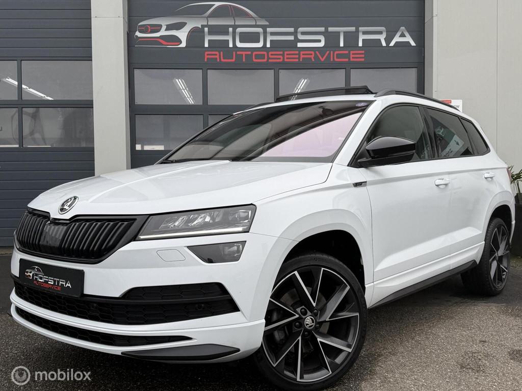 Skoda Karoq 1.5 TSI ACT Sportline Pano Canton-sound Winterpa, Auto's, Skoda, 4 cilinders, Alcantara, Wit, SUV of Terreinwagen