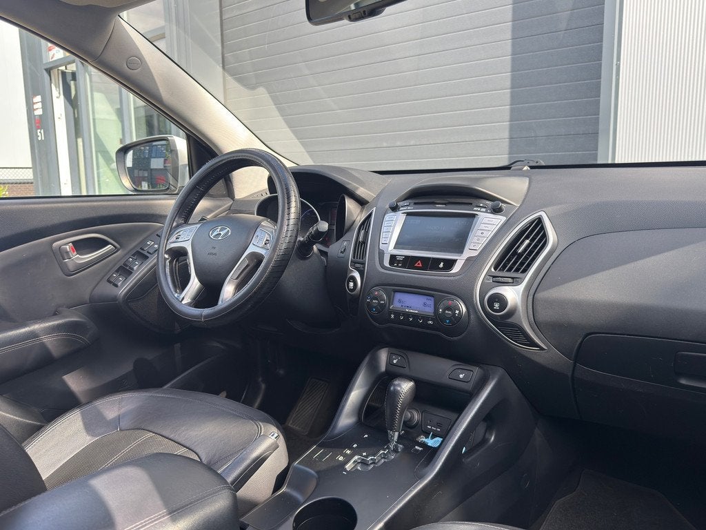 Hyundai Ix35 2.0i 4WD i-Catcher / AUTOMAAT / SCHUIFDAK / NAP, Auto's, Hyundai, Automaat, Gebruikt, 4 cilinders, 163 pk