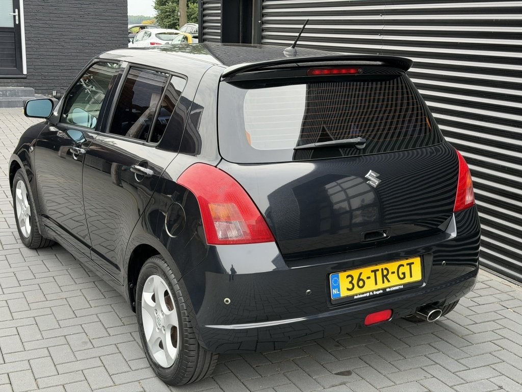 Suzuki Swift 1.3 Shogun| 5DRS| ZWART| AIRCO| CRUISE| PDC| NA, Stof, 965 kg, 400 kg, Origineel Nederlands