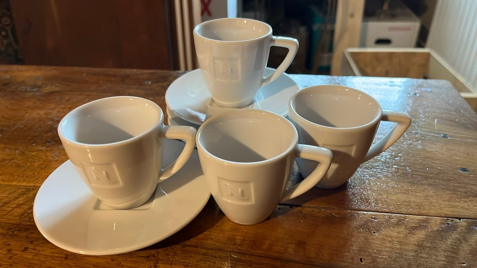 Nespresso Kopjes en Schotels - Set van 4, Huis en Inrichting, Overige merken, Keramiek, Ophalen of Verzenden, Zo goed als nieuw